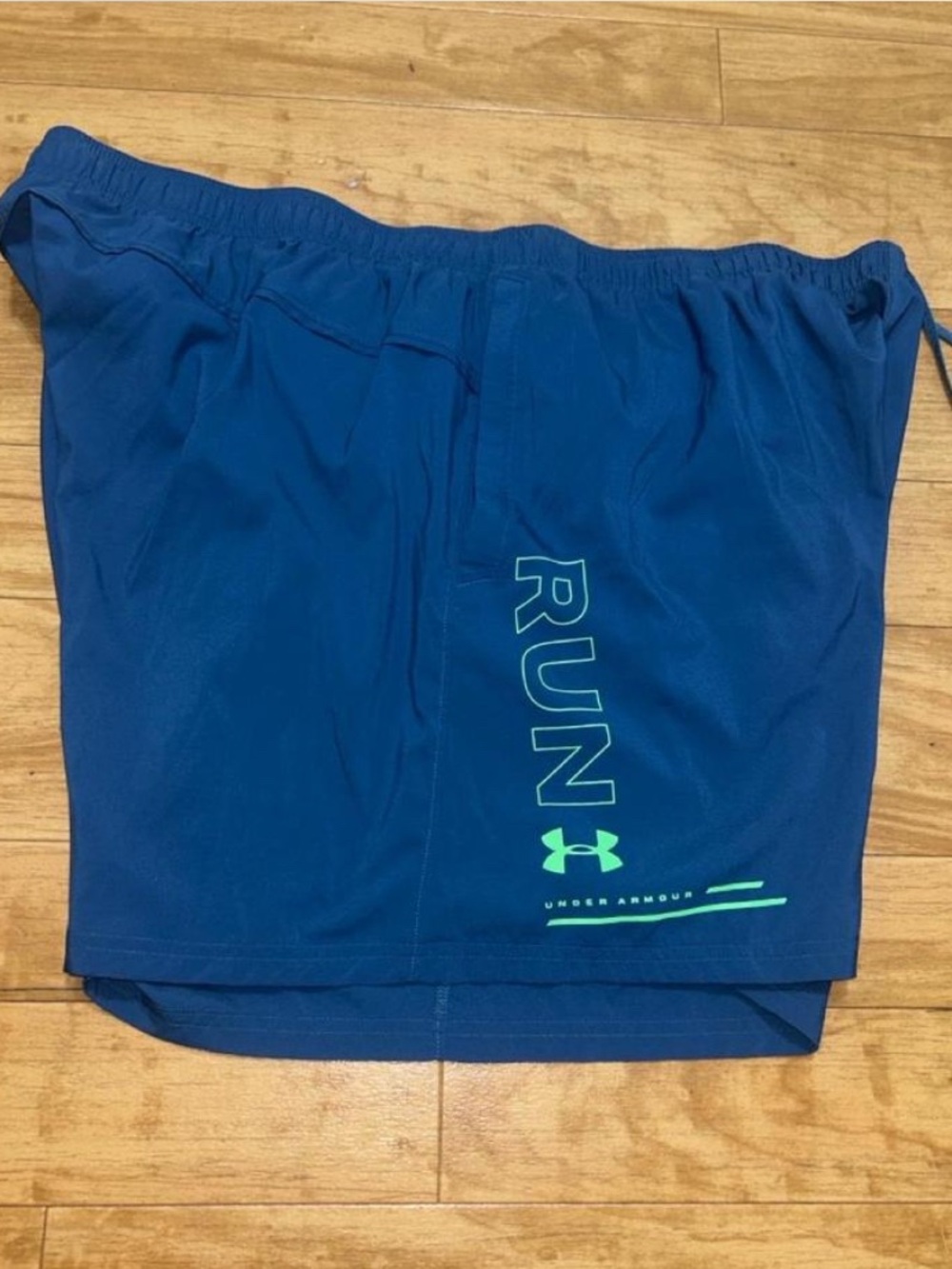 Under Armour Men’s Royal Blue RUN Training Shorts with Neon Accent